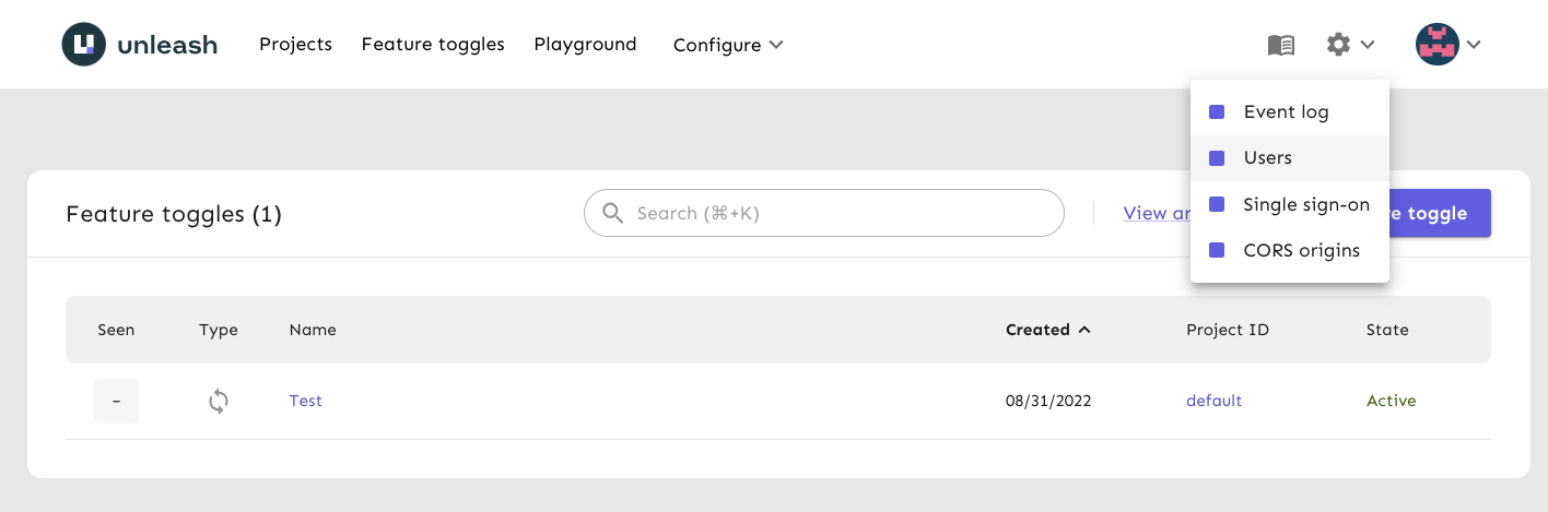 The settings menu in the Unleash nav bar with the "users" link highlighted.